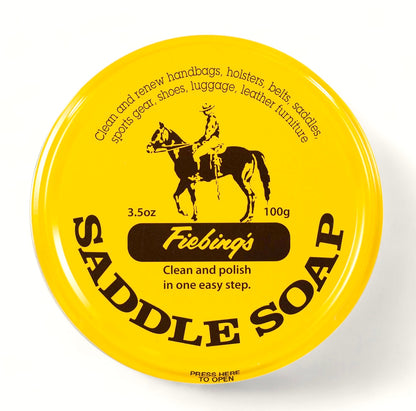 Gelbe Dose Fiebing's Saddle Soap zur Reinigung und Pflege von Lederprodukten wie Sätteln und Taschen