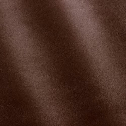 Braunes Echtleder mit feiner Struktur und sanften Lichtreflexen, Ledertextur Hintergrund